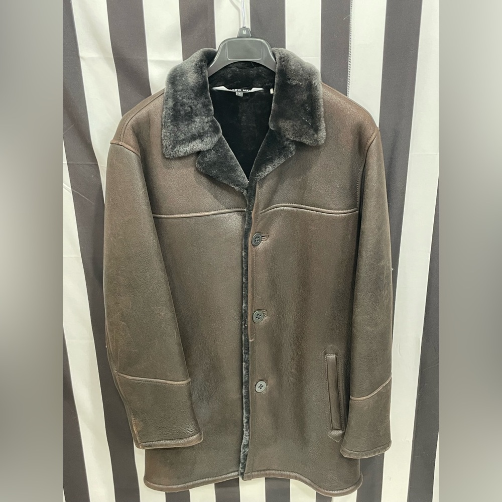 Men’s genuine shearling coat. NWOT large